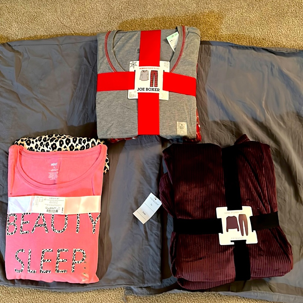 New pj’s the solid velour is size Large. The other two are XL.